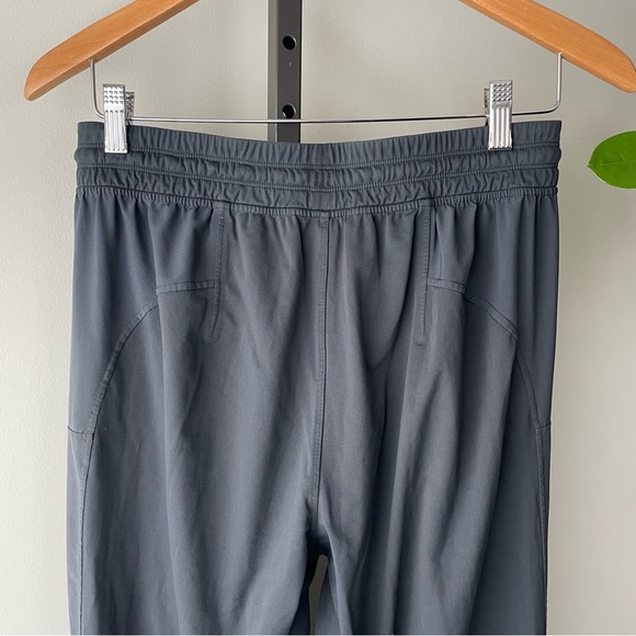 Lululemon Chill Motion Pant Melanite Ankle Zipper Snap Pocket Size Medium - Picture 2 of 11